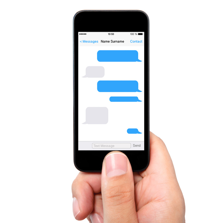 man hand holding the phone with sms chat a screen